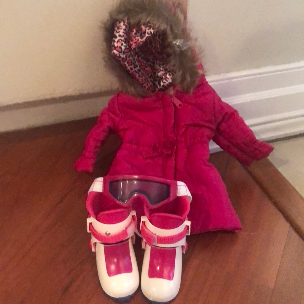 American girl jacket, boots and googles